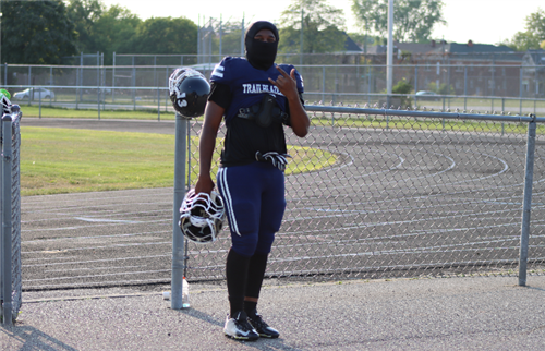 Student in a football uniform